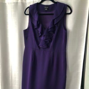 Purple ruffled dress.
